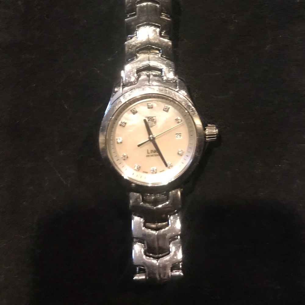 Tag Heuer mother of pearl/diamond women’s watch